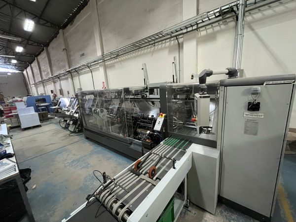 2018 KUGLER WOMAKO - PROBIND W - BW PaperSystems Made in Germany - Spiral metal , Plastic Spiral and Double Wire Binding Machine : Hand feeding Station + Dividing + Punching station + Collating + Aligning + Binding and delivery of final product . Size range 330mm Bound Side 75mm Size range 450mm Unbound Size 90mm , Thickness of articles 23mm , Punching production Speed 105 Cycles/min , Spiral production Speed 35 products / min . All Owners Manuals .